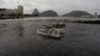 Rio Olympics Filthy Water: Thrash floats on the water of Botafogo beach next to the Sugar Loaf mountain and the Guanabara Bay where sailing athletes will compete during the 2016 Summer Olympics in Rio de Janeiro, Brazil, Saturday, July 30, 2016. 