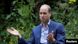 Britain's Prince William speaks during a visit to the Garden House, part of the Light Project, which works on getting people safely off the streets throughout the coronavirus disease (COVID-19) outbreak, in Peterborough, Britain, July 16, 2020.