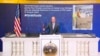 NYSE security chief Kevin Fitzgibbons rings the closing bell, April 15, 2020, in New York, to thank Fiat Chrysler workers who are shipping masks to those in need. The NYSE is saluting COVID responses via its #Gratitude campaign.
