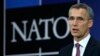 NATO Secretary General Jens Stoltenberg speaks at the alliance's headquarters during a NATO foreign ministers meeting in Brussels December 2, 2014.