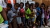 UNICEF Siyen yon Pwotokòl ak Fòs Miltinasyonal la sou Kijan pou Aji ak Timoun Gang yo Rekrite 