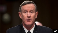 FILE - Navy Adm. William McRaven, commander, U.S. Special Operations Command, testifies on Capitol Hill in Washington, March 5, 2013. McRaven has written an open letter to President Donald Trump, challenging Trump to revoke his security clearance, saying it would be an "honor."