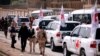 Konvoi Komite Internasional Palang Merah (ICRC) terlihat sedang bergerak menuju Ghouta timur dekat kamp Wafideen di Damaskus, 5 Maret 2018.