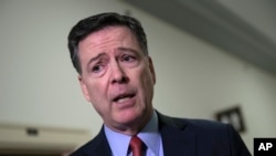 Mantan Direktur FBI James Comey, di Capitol Hill Washington, 17 Desember 2018.