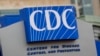 FILE - A sign identifies the Centers for Disease Control and Prevention in Atlanta, Georgia, on March 15, 2020. The Trump administration has frozen many federal health agency communications — including a weekly publication by the CDC — through at least the end of the month.