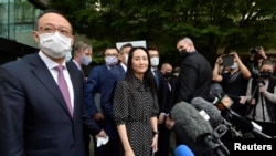 華為公司首席財務官孟晚舟9月24號在加拿大溫哥華一家法院作出裁決後離開法院。