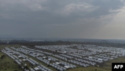 FILE - This aerial view shows the internally displaced persons camp in Bushagara, north of the city of Goma in eastern Democratic Republic of Congo, Jan. 13, 2023.