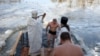 Orthodox Epiphany Tradition Marked by Conflict Near Ukraine Front Lines 