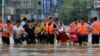 Banjir dan Tanah Longsor di China Barat Kubur 40 Orang