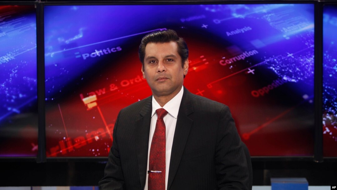 FILE - Senior Pakistani journalist Arshad Sharif poses for photograph prior to recording an episode of his talk show at a studio, in Islamabad, Pakistan, Dec. 15, 2016. 