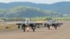 지난 4일 한국 공군 F-15K 전투기 편대가 출격하고 있다.