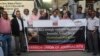 Media representatives shout slogans during a protest in Karachi on Oct. 24, 2022, against the killing of Pakistani news anchor Arshad Sharif in Kenya. 