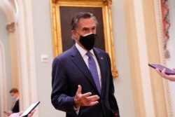 U.S. Sen. Mitt Romney (R-UT) speaks to reporters in the U.S. Capitol in Washington, U.S., Dec. 16, 2020.