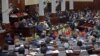 Afghan President Ashraf Ghani, center left, makes an address as he inaugurates a new session of parliament at the parliament house in Kabul, Afghanistan, March 7, 2015.