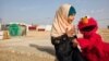 Elmo and Friends Lead Education Effort for Refugee Children