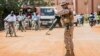 FILE - A soldier from Spain guards the European Union Training Mission (EUTM) camp in Koulikoro, Mali, Nov. 28, 2017. 