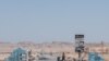 FILE - A checkpoint in the desert of the Somali state of Puntland leads to the port city of Bosaso, Somalia, March 25, 2018. A witness said missiles fired by a suspected U.S. drone hit a mountainous area in Puntland on Friday. (J. Patinkin/VOA)