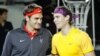 Nadal, Federer Melaju ke Perempat Final Qatar Terbuka