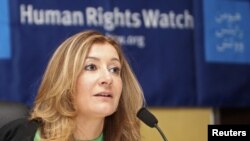 Human Rights Watch (HRW) Middle East director Sarah Leah Whitson, talks during a news conference in Doha June 12, 2012. REUTERS/Stringer (QATAR - Tags: SOCIETY POLITICS)