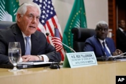 FILE - Tillerson holds a news conference with African Union Commission Chairman Moussa Faki Mahamat after their meeting at AU headquarters in Addis Ababa, Ethiopia, March 8, 2018.