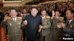 North Korean leader Kim Jong Un reacts during a celebration for nuclear scientists and engineers who contributed to a hydrogen bomb test, in this undated photo released by North Korea's Korean Central News Agency in Pyongyang, Sept. 10, 2017. 