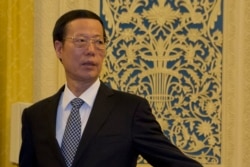 FILE - Then Chinese Vice Premier Zhang Gaoli is seen during a meeting at the Great Hall of the People in Beijing, China, March 16, 2016.