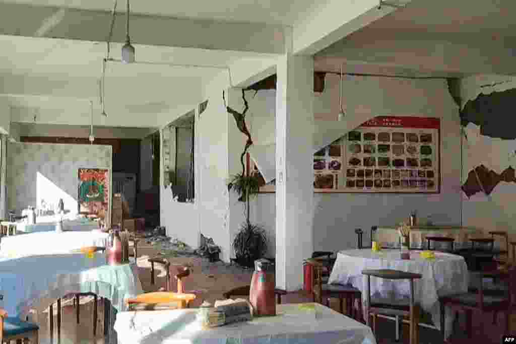 This frame grab from a user-generated content (UGC) video shows cracks on the walls of a restaurant in Lhatse County in China's Tibet after an earthquake struck the area. A devastating earthquake in Tibet killed at least 126 people and collapsed "many buildings," state media reported, with tremors also felt in neighboring Nepal's capital Kathmandu and parts of India. 