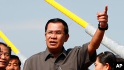 FILE - Cambodian Prime Minister Hun Sen delivers a speech in Phnom Penh. Cambodian officials said the deportees were sent to China because they had committed crimes against Chinese citizens.