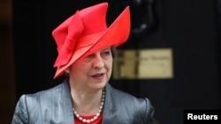 Britain's Prime Minister Theresa May leaves 10 Downing Street in London, March 12, 2018. 