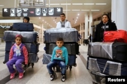 The al-Qassab family, Iraqi Christian refugees from Mosul, at Beirut international airport ahead of their travel to the United States, Lebanon February 8, 2017.
