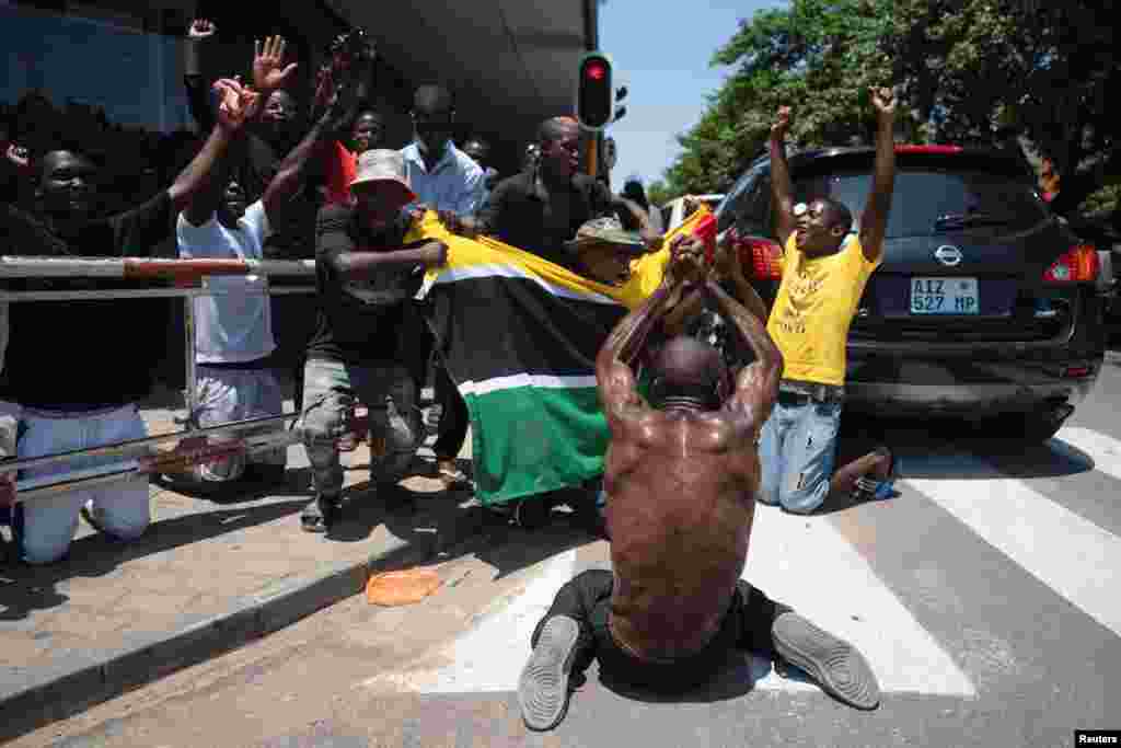 Supporters of opposition member Venancio Mondlane protest during the inauguration of the ruling Frelimo party's leader Daniel Chapo as Mozambique's newly elected President in Maputo.