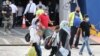 Greece Steps Up Refugee Transfers from Congested Lesbos 