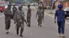 FILE - Nigerian soldiers are seen on patrol in Abuja.