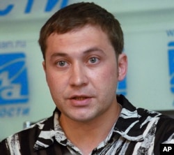 FILE - Russian Muslim Airat Vakhitov speaks at a news conference in Moscow, June 28, 2005.