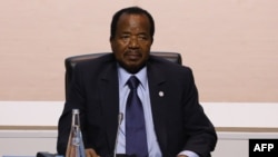 FILE - Cameroon's President Paul Biya attends a session of the One Planet Summit on Dec. 12, 2017, at La Seine Musicale venue on l'ile Seguin in Boulogne-Billancourt, west of Paris.