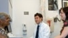 Edward Machtinger, director of the Women's HIV Program at UCSF, and clinical social worker Beth Chiarelli talk with patient Vicki Blake.