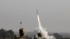 FILE - An Israeli missile launched from the Iron Dome defense missile system, designed to intercept and destroy incoming short-range rockets and artillery shells, is pictured in the southern Israeli city of Sderot, Nov. 12, 2019.