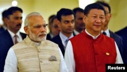 印度总理莫迪(左)和中国国家主席习近平(资料照片)
