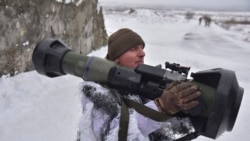 A Ukrainian soldier takes part in an exercise for the use of NLAW anti-tank missiles at the Yavoriv military training ground, close to Lviv, western Ukraine, Jan. 28, 2022.