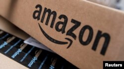FILE - Amazon boxes are seen stacked for delivery in the Manhattan borough of New York City.