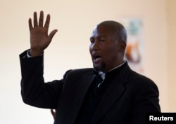 Mandla Mandela, grandson of former South African President Nelson Mandela, sings during a church service near the home of the former president in Qunu, June 30, 2013.