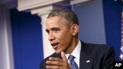 FILE - President Barack Obama speaks during a news conference in the Brady Press Briefing Room of the White House in Washington, Dec. 19, 2014.