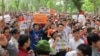 Around 500 people gather in a park in central Hanoi to protest China's deployment of an oil rig in contested waters in the South China Sea, May 11, 2014. (Marianne Brown/VOA)
