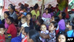 တိုက်ပွဲများကြောင့် ရခိုင်ပြည်နယ် ကျောက်တော်မြို့သို့ ထွက်ပြေးတိမ်းရှောင်လာသည့် ဒေသခံများ။ (ဒီဇင်ဘာ ၂၃၊ ၂၀၁၈)