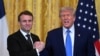 US President Donald Trump and French President Emmanuel Macron shake hands at the end of a joint press conference in the East Room to the White House in Washington, DC, on February 24, 2025. (Photo by ROBERTO SCHMIDT / AFP)