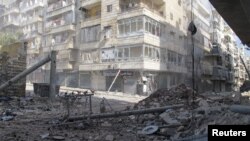 A street after clashes between Free Syrian Army fighters and forces loyal to Syria's President Bashar Al-Assad in Salah Edinne district in the center of Aleppo August 8, 2012. 