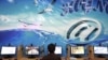 FILE - An Iranian man surfs the Internet at a cafe in Tehran, Iran, Sept, 17, 2013. Facebook says it has removed 82 Iran-linked accounts for spreading misinformation.