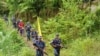 Myanmar police officers patrol along the border fence between Myanmar and Bangladesh in Maungdaw, Rakhine State, Myanmar (MOI)