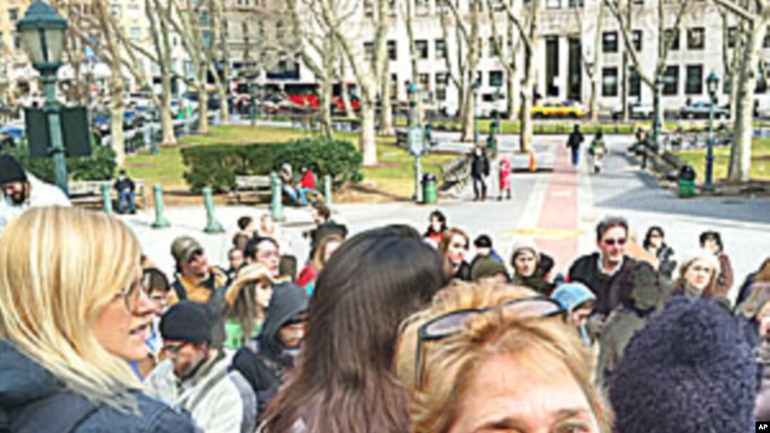 Food activist Gianni Ortiz joined with others to protest the Monsanto Company's legal actions against organic small farms, January 31, 2012.