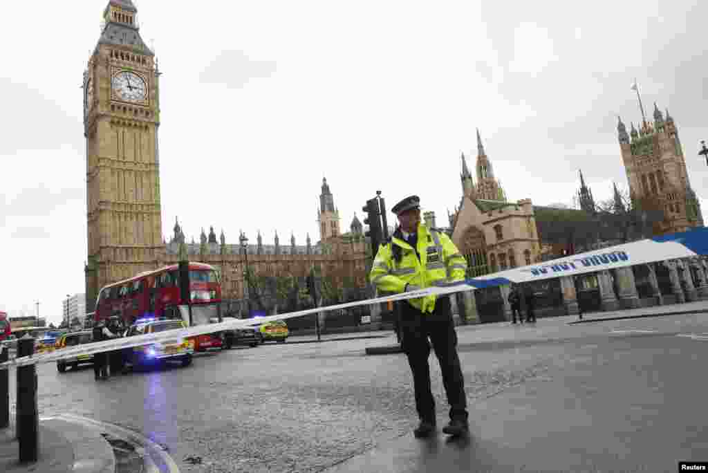 Police tapes off Parliament Square after reports of loud bangs, in London, Britain, March 22, 2017.